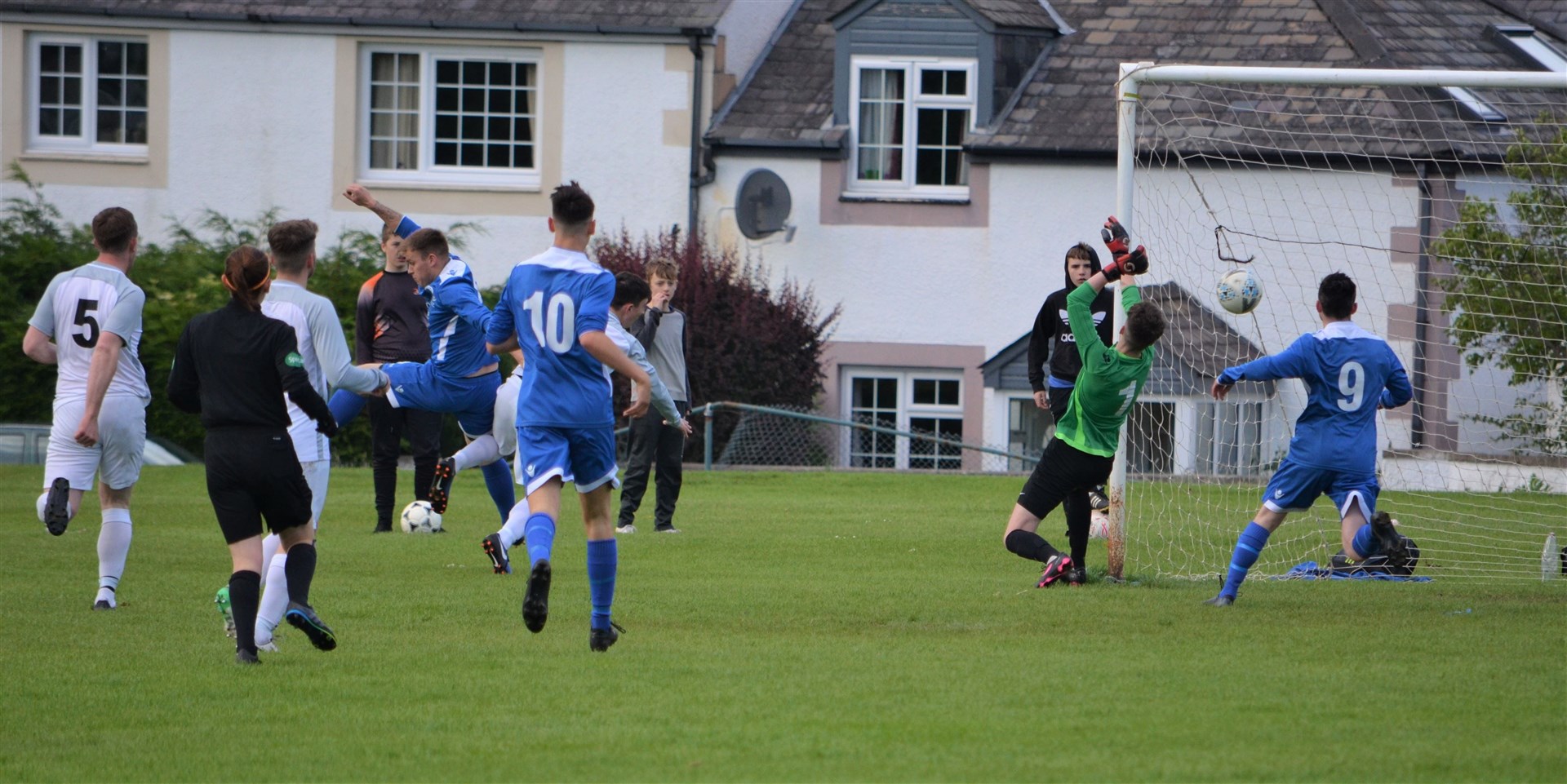 Craig Ross scores his first goal in a hat trick for Maryburgh against Bellmac. Picture: George Mackenzie