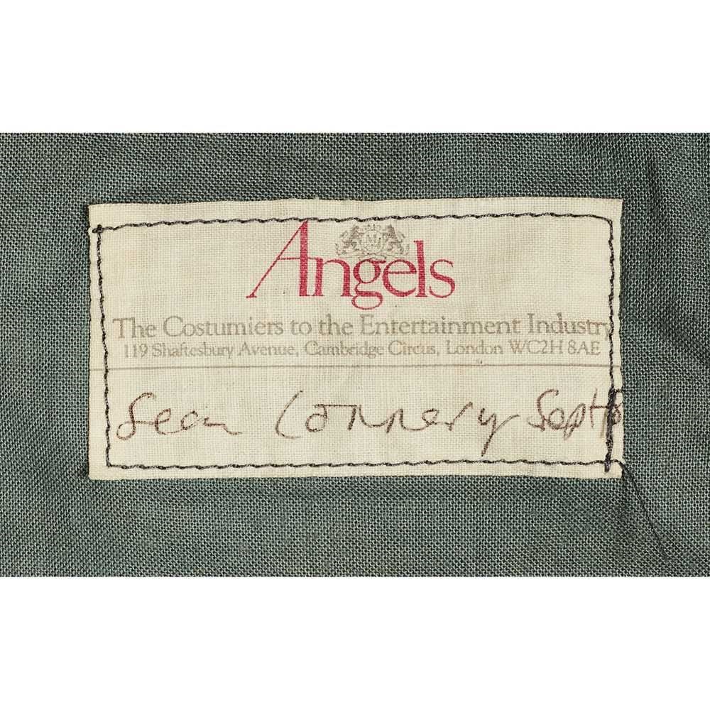The label on the grey suit believed to have been worn by Sir Sean Connery in The Untouchables (Lyon and Turnbull/PA)