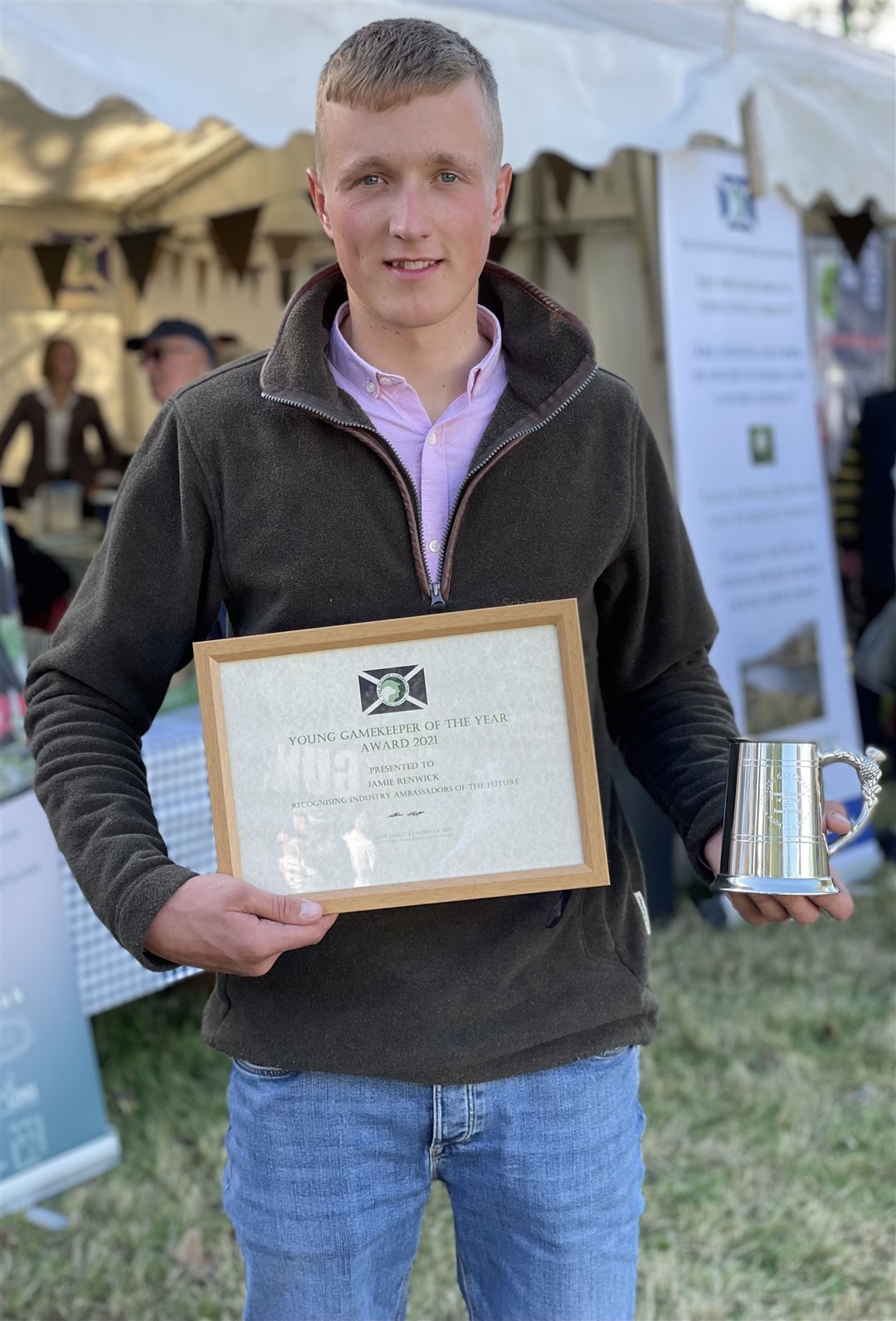 Jamie Renwick with his Scottish Young Gamekeeper of the Year Award 2021