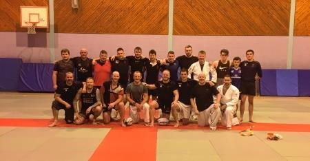 Ross Sutherland with the coaches at Invergordon Judo Club who put them through their paces.