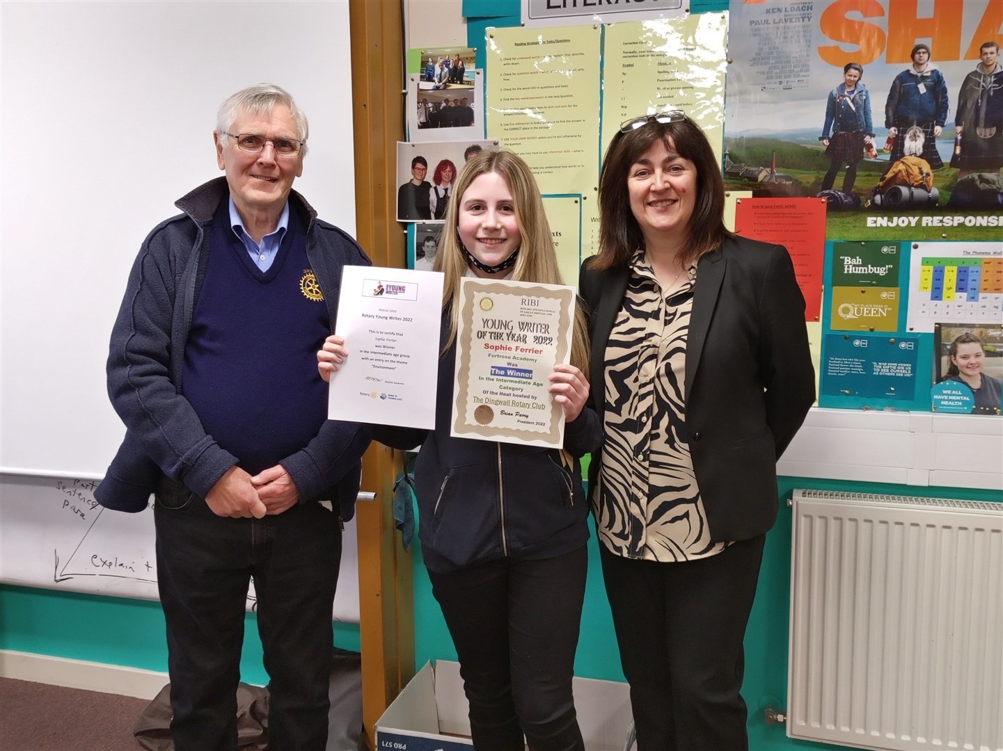 Sophie Ferrier with Brian Parry from Dingwall Rotary Club and acting head, Jacquie Ross.