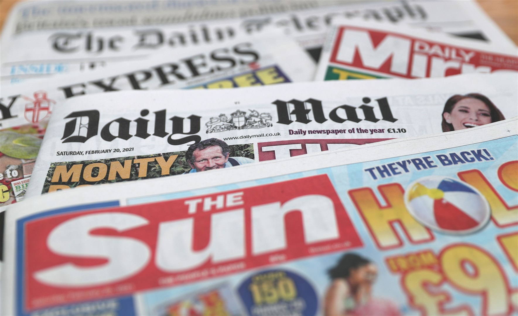 The Sun owner News Group Newspapers reported a drop in turnover (PA)