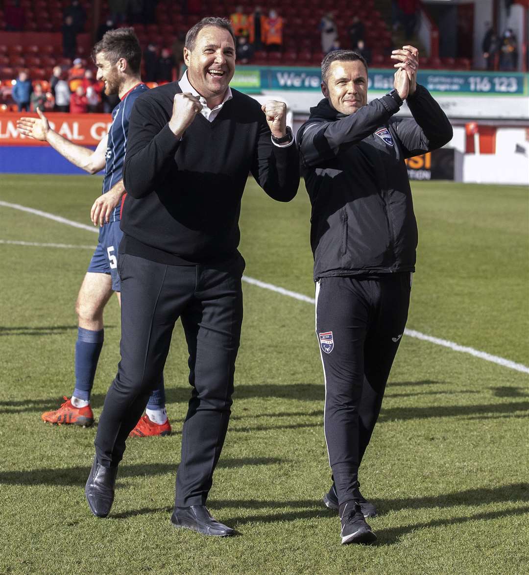 Malky Mackay and assistant manager Don Cowie celebrate sealing top six status at Aberdeen.