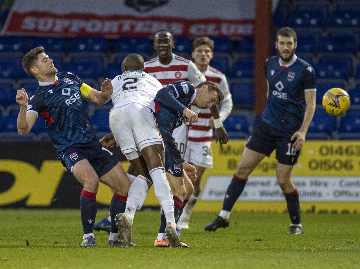 Picture - Ken Macpherson, Inverness. Ross County(0) v Hamilton(2). 19.12.20. Ross County's Iain Vigurs and Jordan Tillson combine to clear from Hamilton's Hakeem Odoffin.