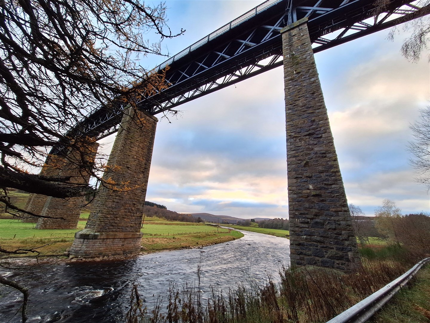 Passing below the railway viaduct at Tomatin.