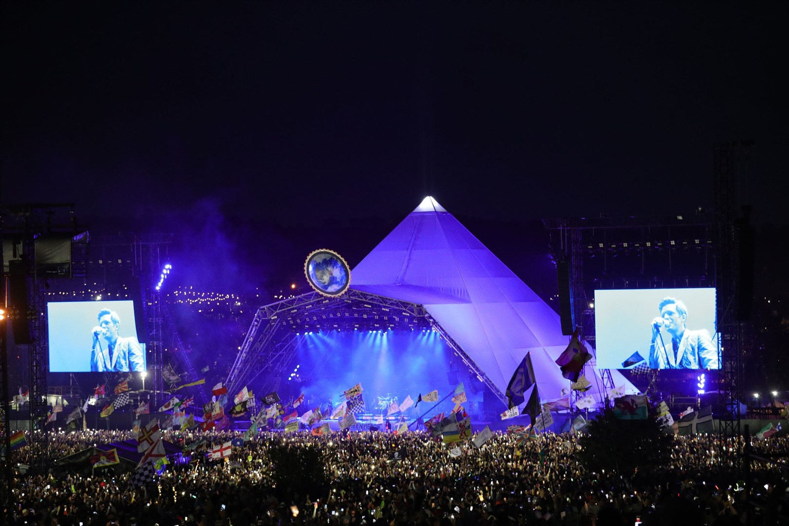 The Killers playing the Pyramid Stage at Glastonbury Festival in 2019 (PA)