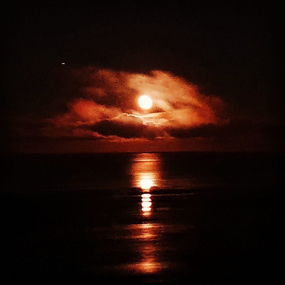 The moon over the sea.