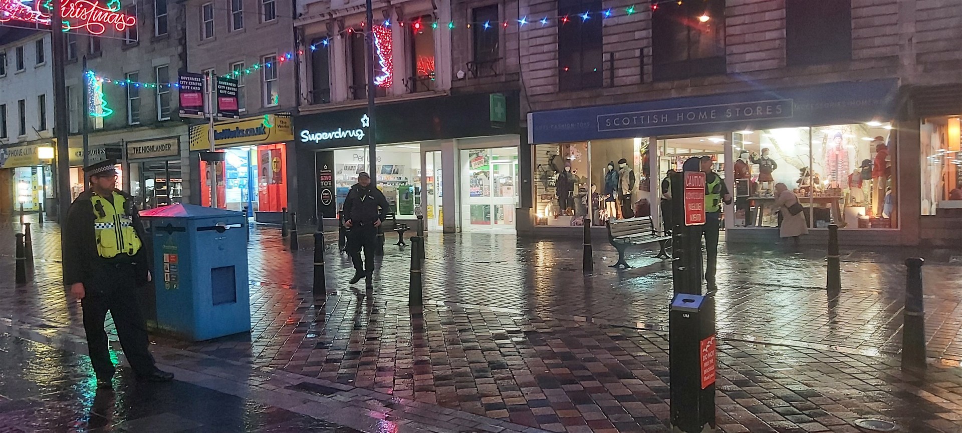 Police in the High Street earlier.