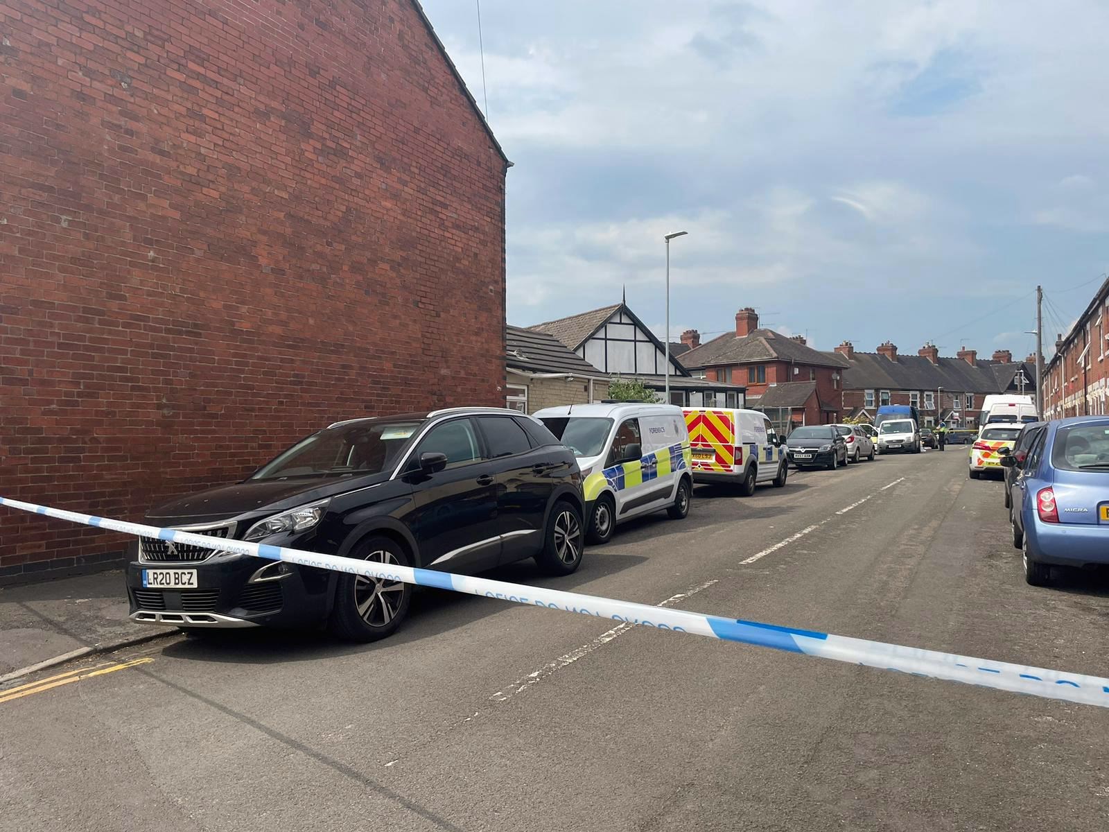 A police cordon on Flax Street, Stoke-on-Trent, where the victims of a suspected double murder were found (Stephanie Wareham/PA Wire)