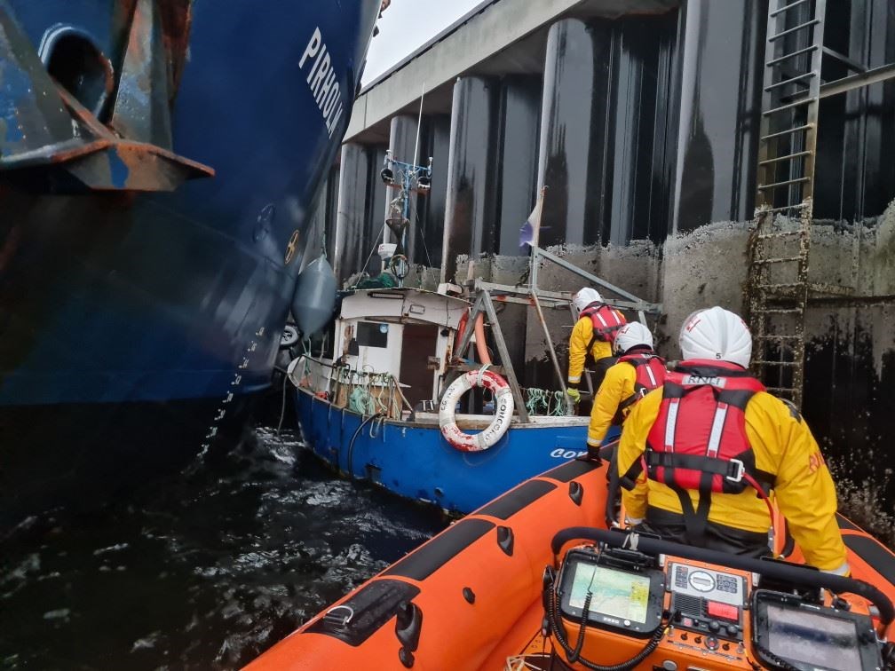 The vessel between the pier and the cargo ship. Picture: Kyle RNLI
