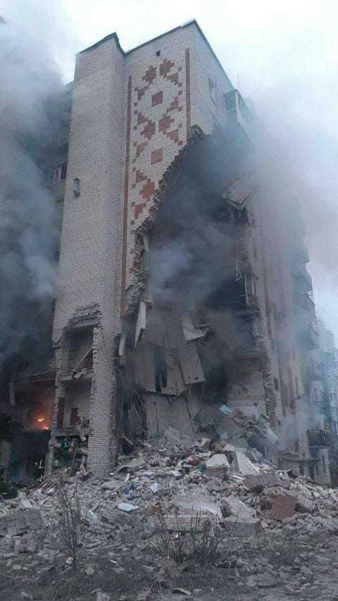 A burning building photographed by displaced Ukrainian.