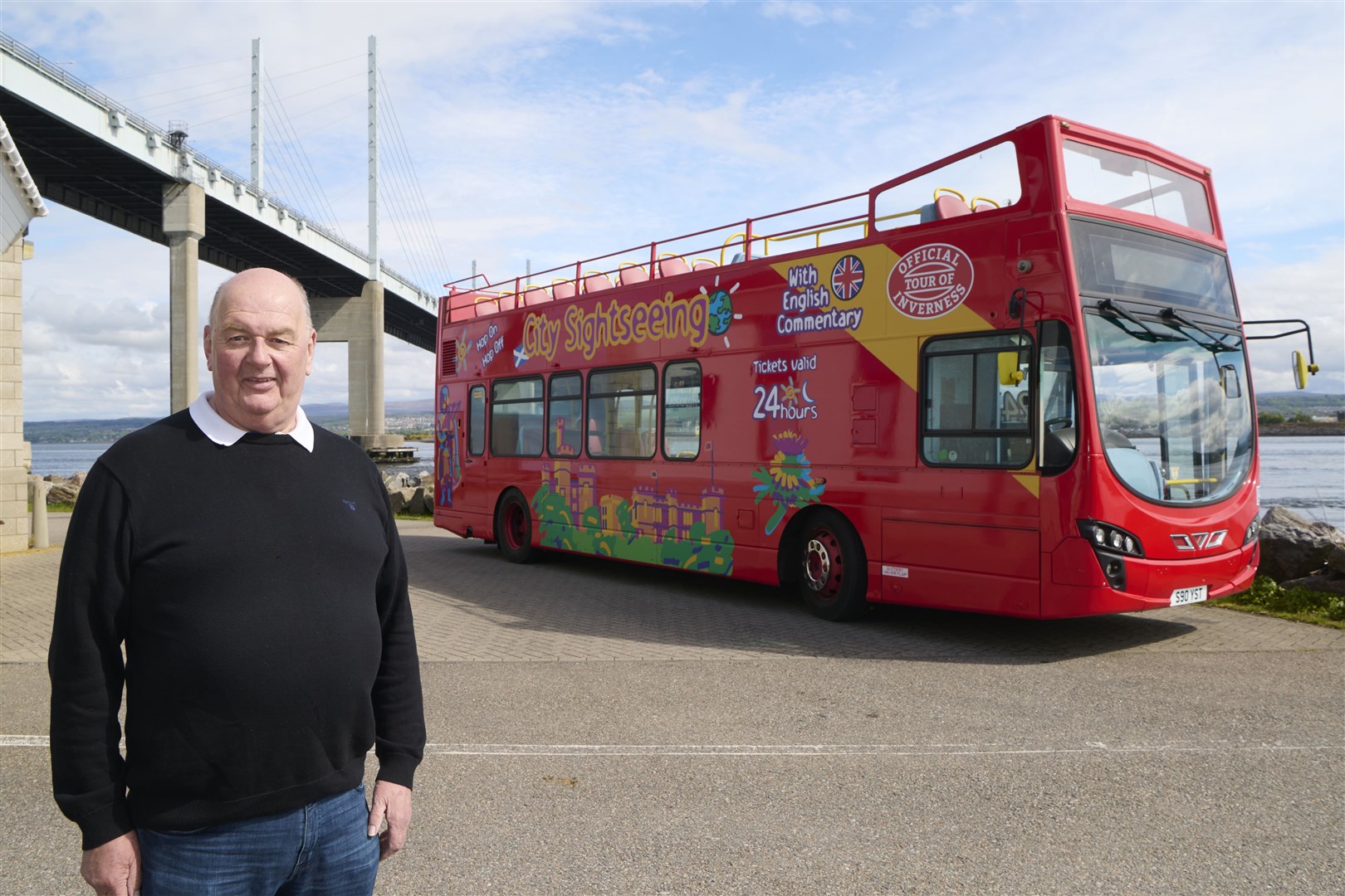 Donald Mathieson, D & E MD, with one of their new City Sightseeing Buses