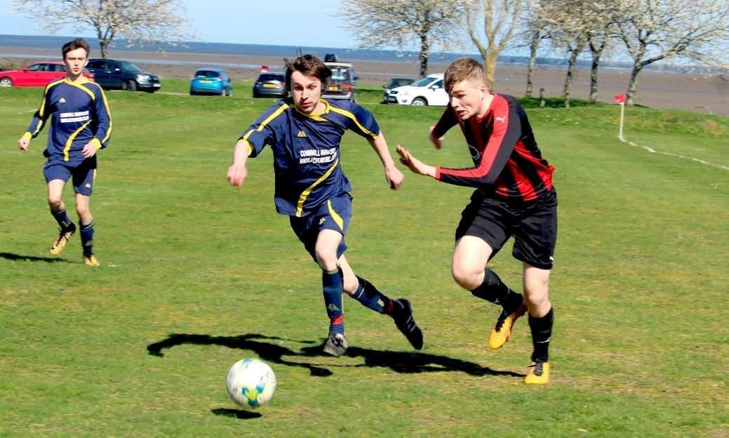 Finn As-Chainey on the wing for Tain Thistle against Melvich. Picture: Niall Harkiss