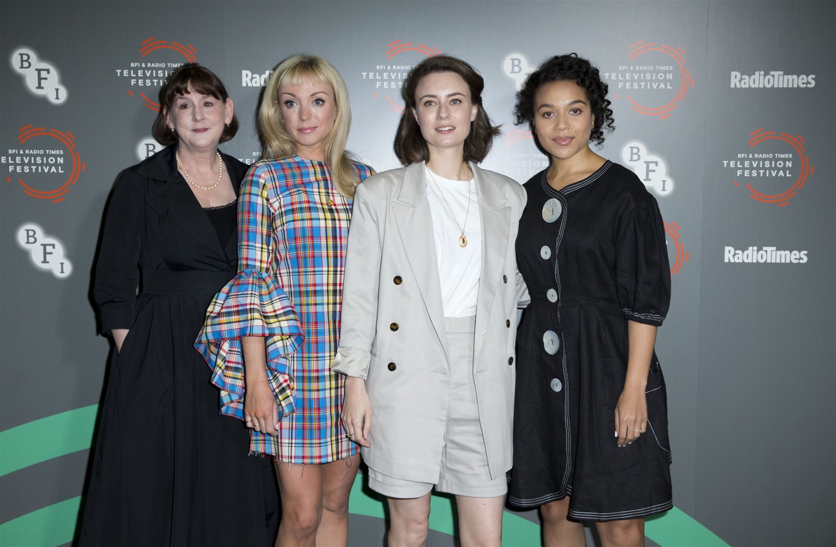 Heidi Thomas with cast members Helen George (Trixie Aylward), Jennifer Kirby (Valerie Dyer) and Leonie Elliott (Lucille Anderson) during the BFI and Radio Times Television Festival in 2019 (Isabel Infantes/PA)