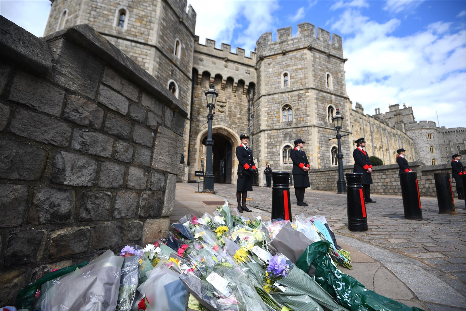 Flowers left outside Windsor Castle following the announcement of the death of the Duke of Edinburgh (Victoria Jones/PA)