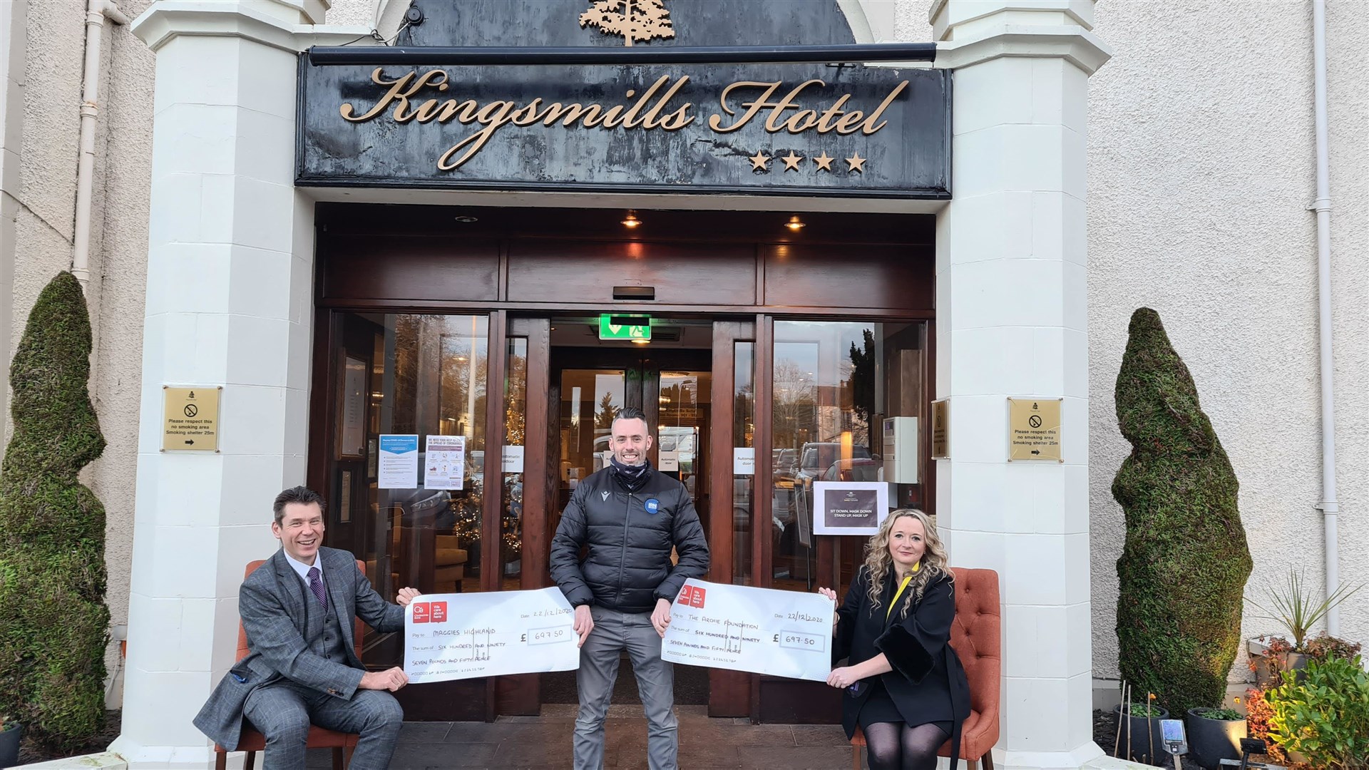 Craig Ewan, general manager of the Kingsmills Hotel, Kenny Smith, of Torridon, and Mary Nimmo, chairwoman of the Archie Foundation Highland fundraising committee.