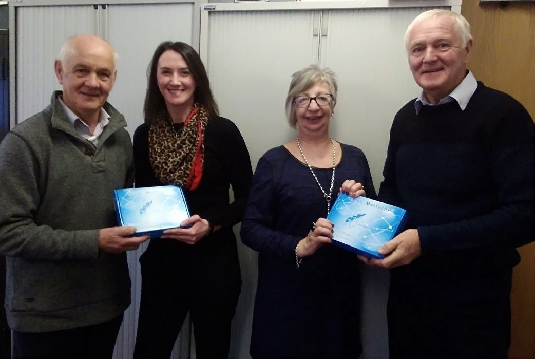 Rod Shanks, Amy Scobbie, Lynda Campbell, Don Shanks hand over the equipment in memory of the late Mollie Shanks in a photograph taken before the coronavirus lockdown.