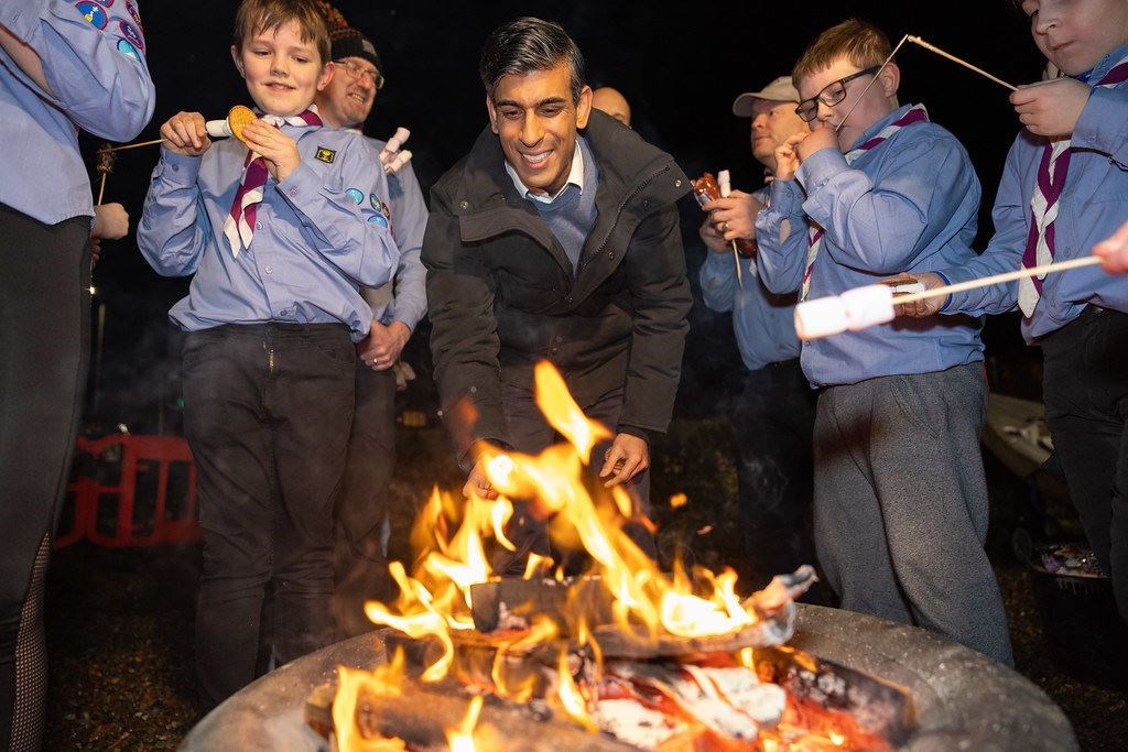 12/01/2023. Inverness, United Kingdom. The Prime Minister Rishi Sunak meets a sea scout group in Inverness and toasted marshmallows with them over an open fire. Picture by Simon Walker / No 10 Downing Street