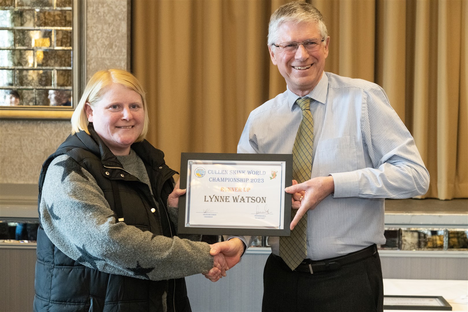 The Lord-Lieutenant of Banffshire Andrew Simpson presents Lynne Watson with her runner-up certificate in the Tradition Skink category. Picture: Beth Taylor