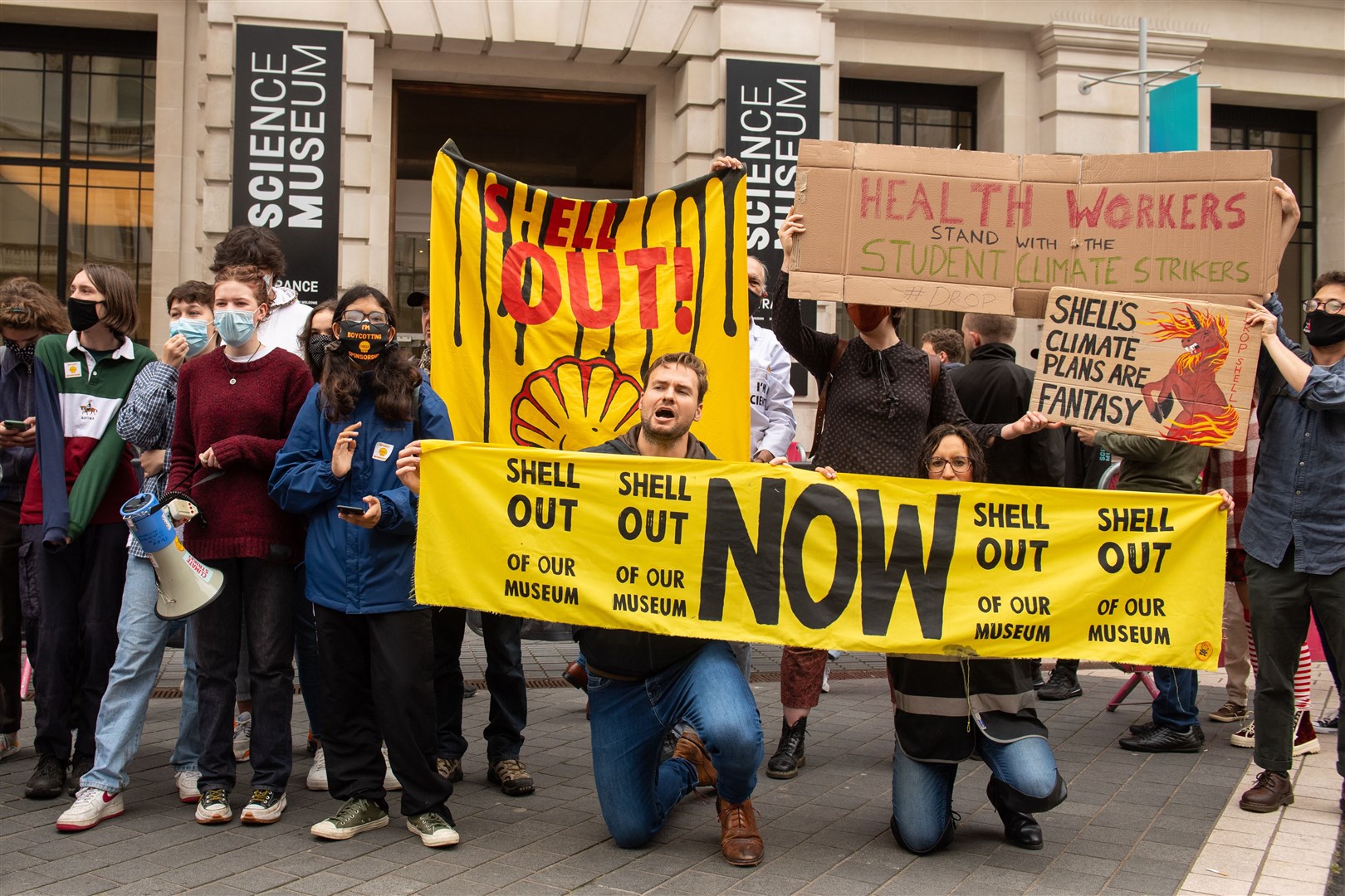 Climate activists take part in an anti-Shell protest at the Science Museum in London (Dominic Lipinski/PA)