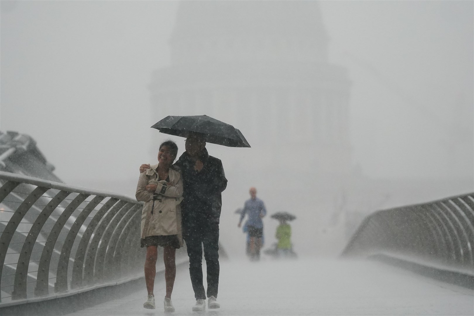 After weeks of sweltering weather, heavy rain hit parts of England – but it is not enough to end the drought (Victoria Jones/PA)