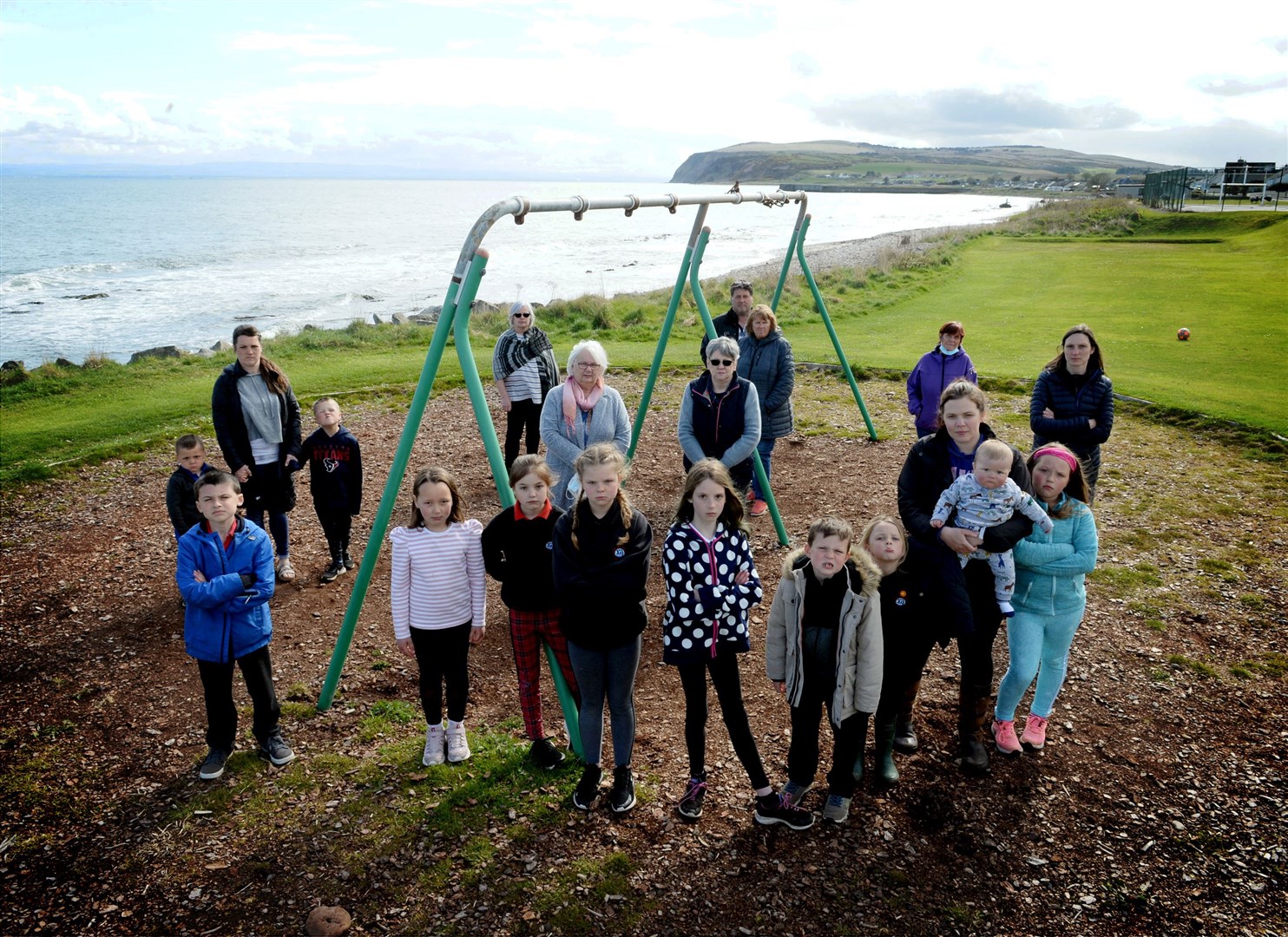 Maureen Ross and Norma Balfour (centre) of the Seaboard Centre with locals from the Seaboard villages of Hilton, Balintore and Shandwick unhappy about swings being taken away. Picture: James Mackenzie