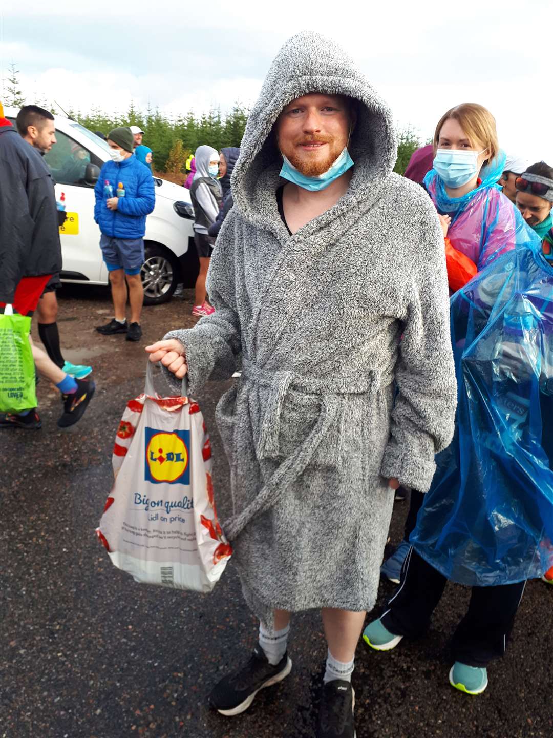 Dressed for the occasion - a fellow marathon runner dons his dressing gown.