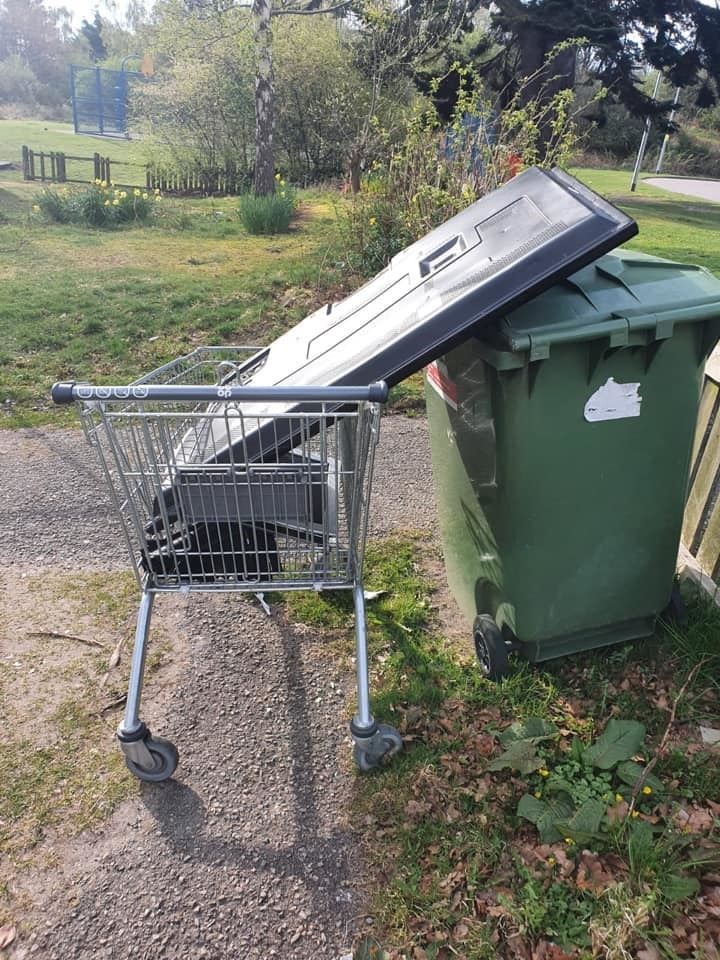 The television was left in a shopping trolley next to a wheelie bin, blocking access into the bargain.
