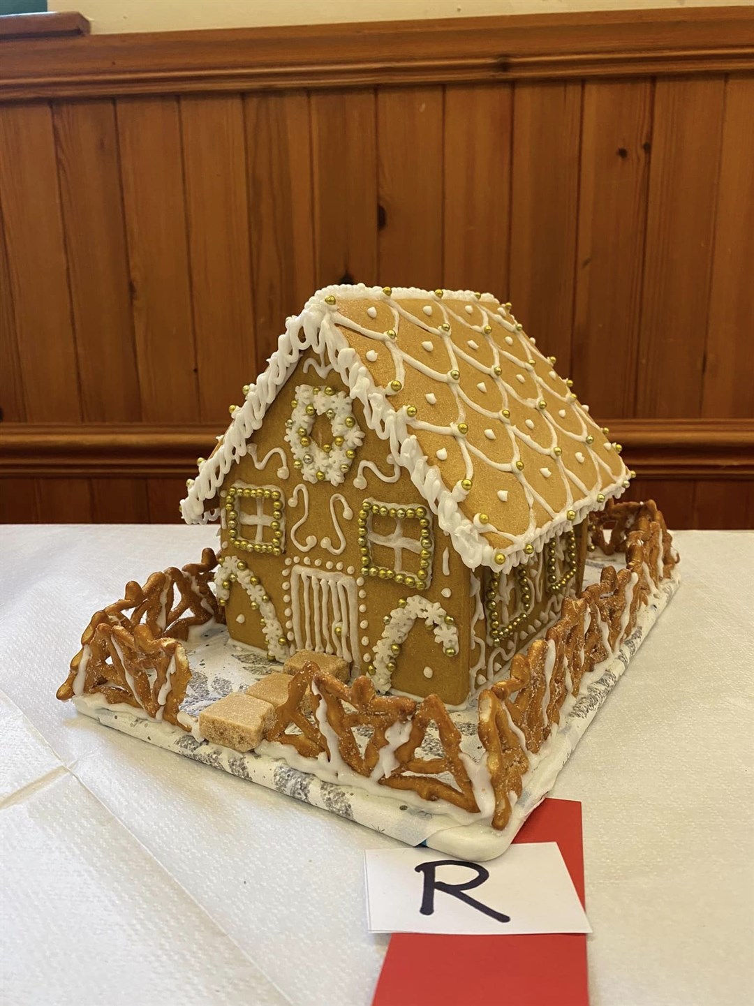 Rowena Fellows scooped 1st prize for her decorative gingerbread house.