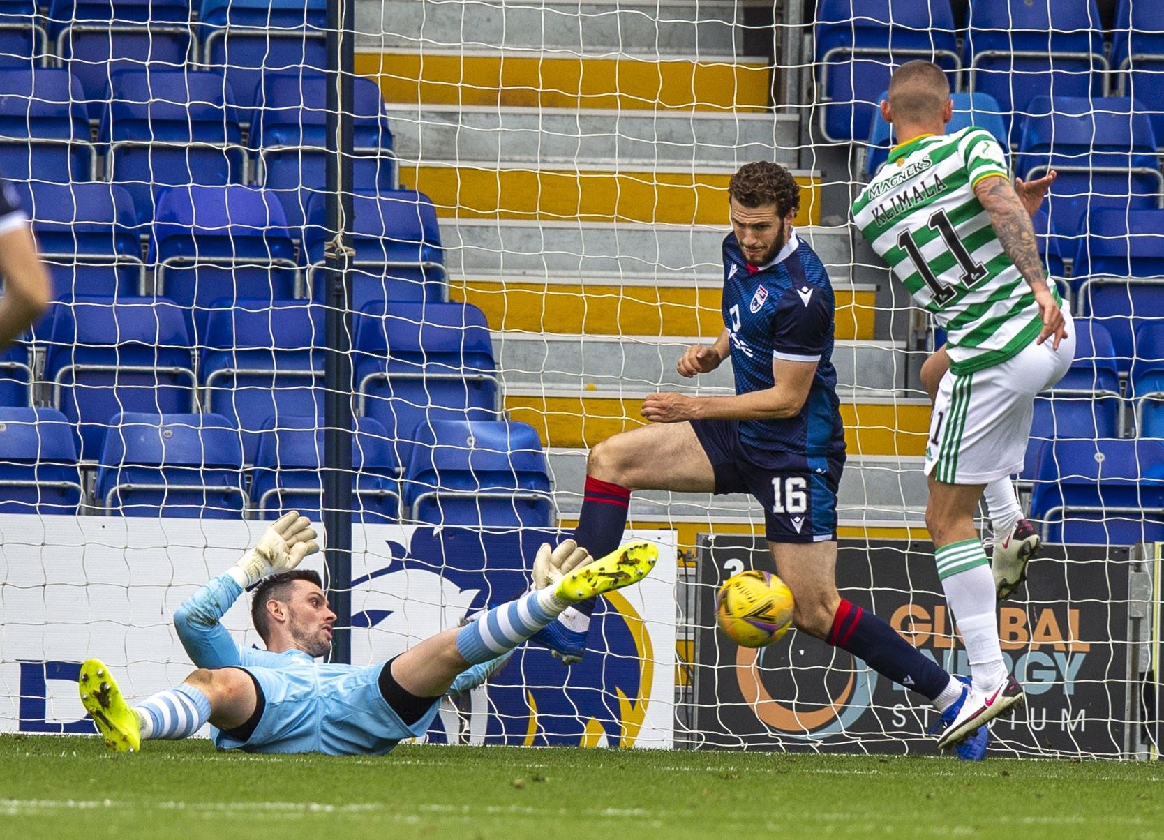 Alex Iacovitti (centre) thwarts Celtic’s Patryck Klimala on the goal-line with keeper Ross Laidlaw’s help. Picture: Ken Macpherson