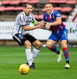 Callum Morris (left) in action for Dunfermline last year has signed for Ross County along with Keith Watson.
