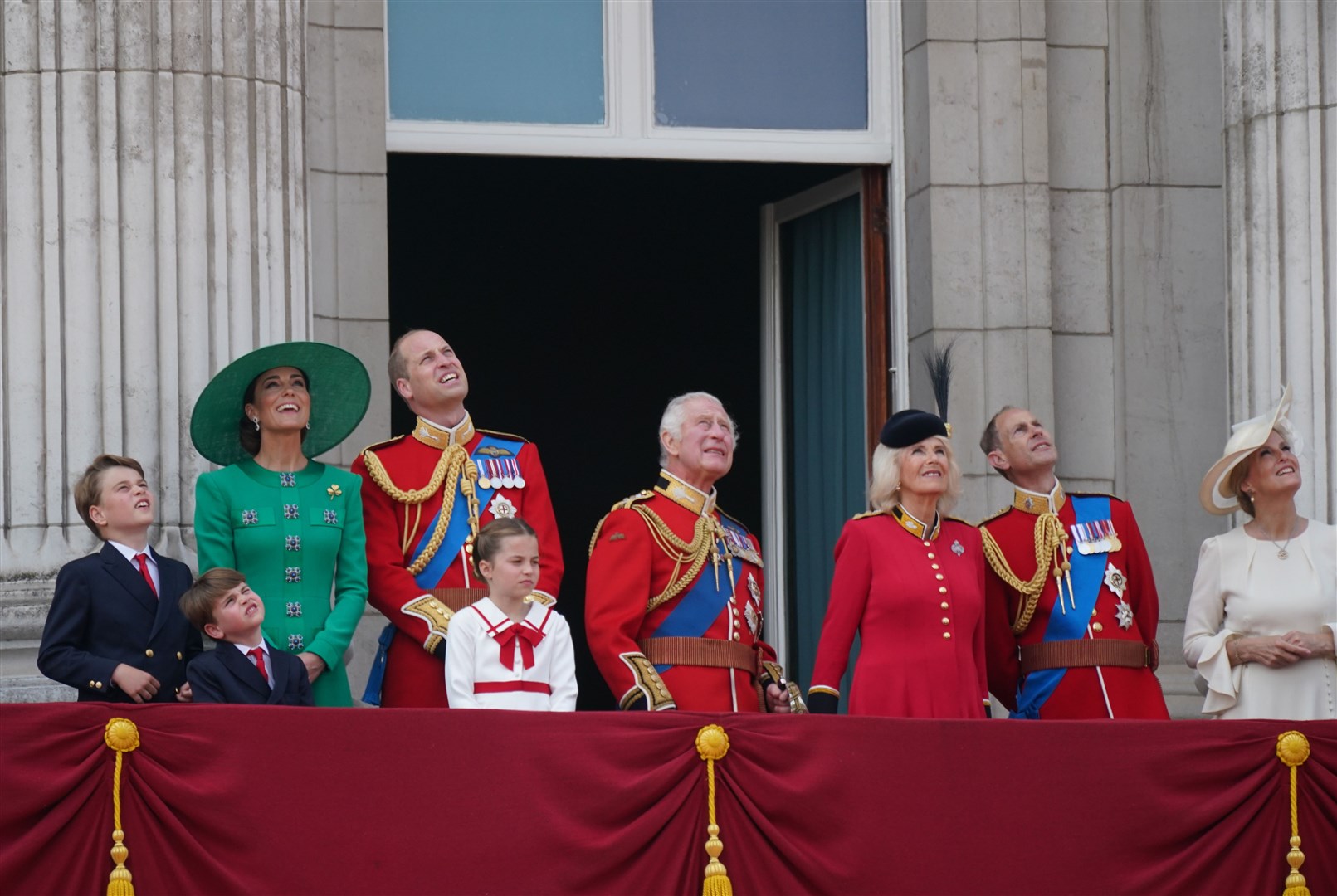 The royal family watch the flypast from the balcony of Buckingham Palace (Yui PA)