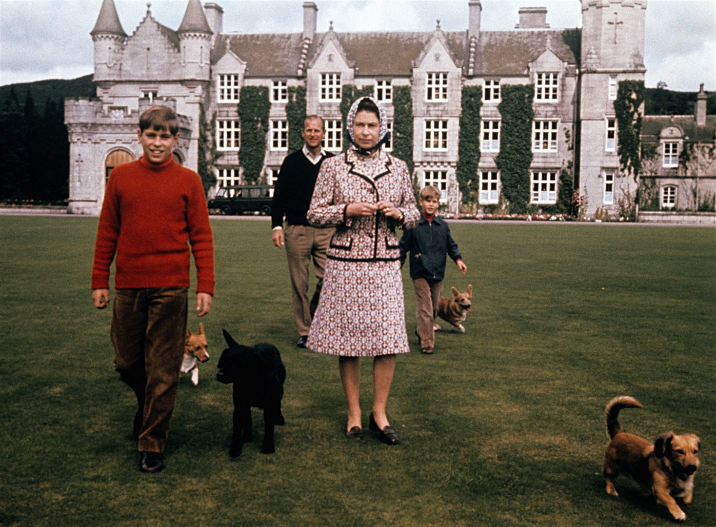 Andrew, the Duke of Edinburgh, the Queen and Edward in the grounds of Balmoral (PA)