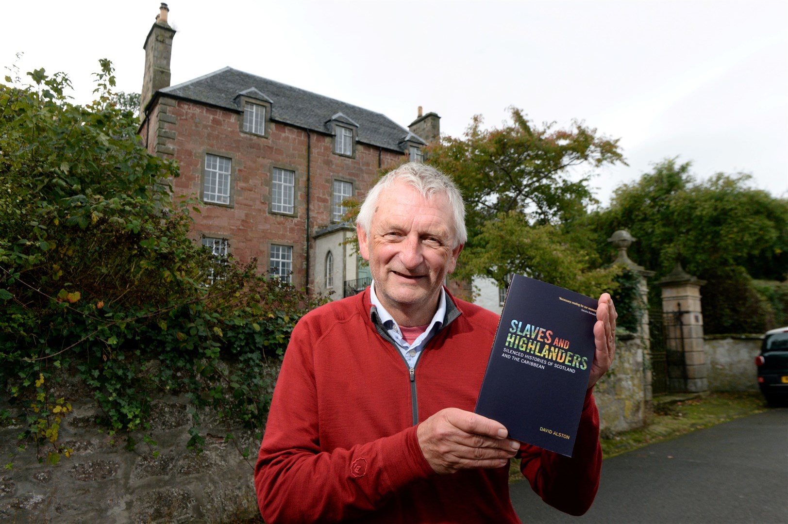 David Alston's with his book, Slaves and Highlanders. He is pictured outside Bellevue House which is talked about in the book. Picture: James Mackenzie.