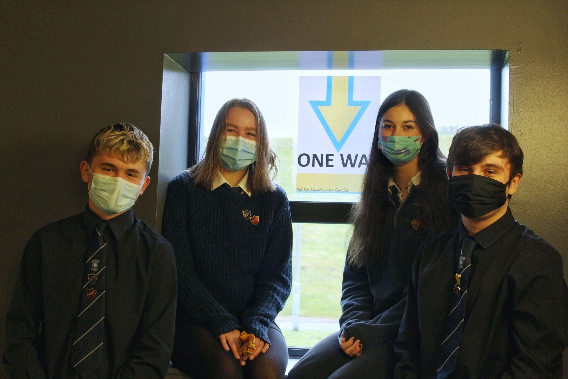 Ross Stewart, Kirsty Arnaud, Elsa Fearn and Ruairidh McGee in one of the school stairwells. As part of the one-way system, all stairwells are up or down only. Pupils wear masks when walking between classes. Picture: Melvine Lynch