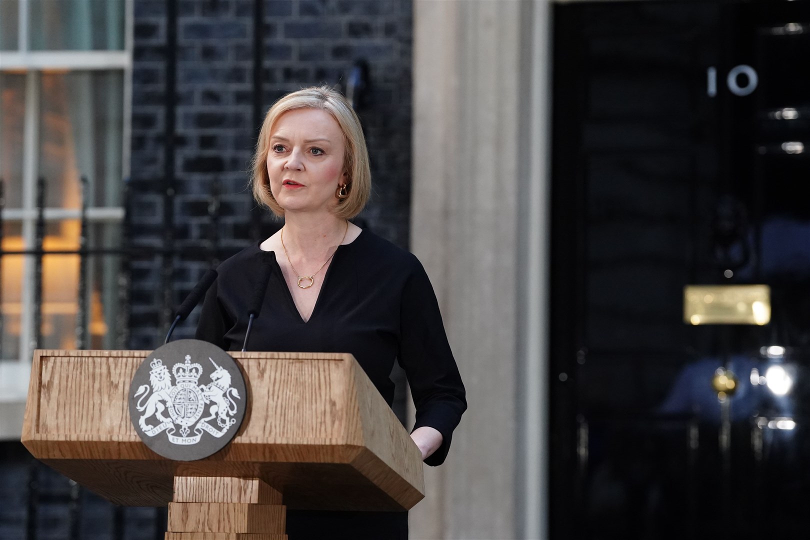 Ms Truss reading a statement outside 10 Downing Street following the announcement of the death of Queen Elizabeth II (Ian West/PA)