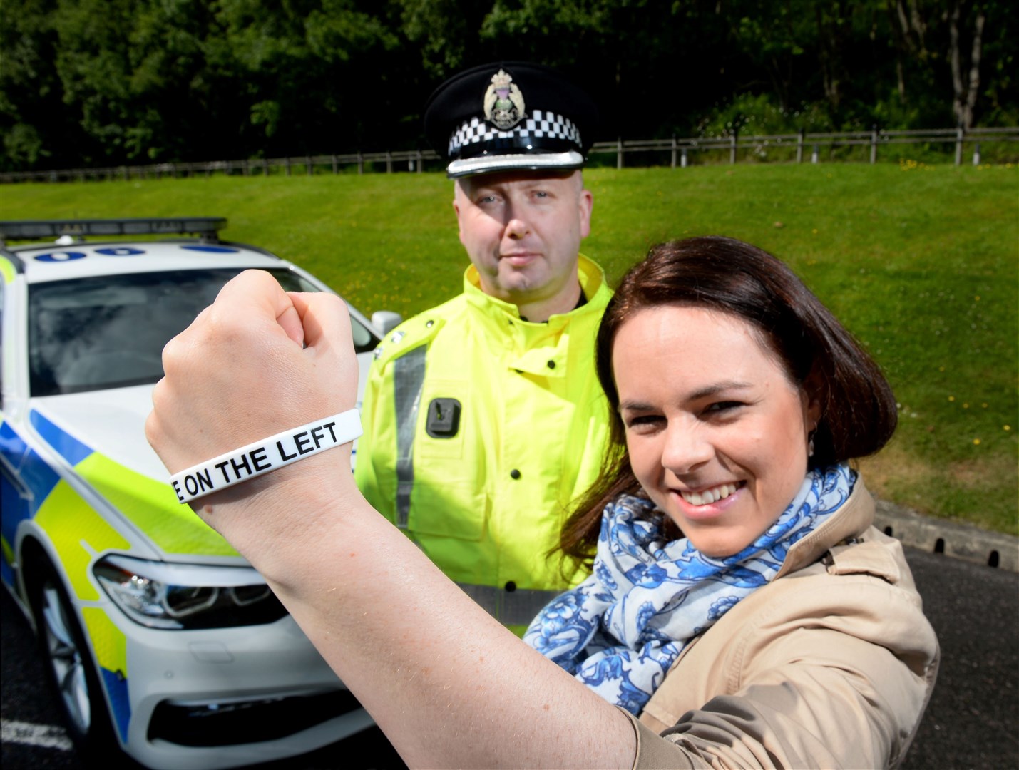 MSP Kate Forbes helped launch a campaign at tourist hotspot Urquhart Castle, just off the A82, to remind motorists to drive on the left when visiting Scotland in summer last year. Inspector Kevin MacLeod also supported the message. Picture: Gary Anthony