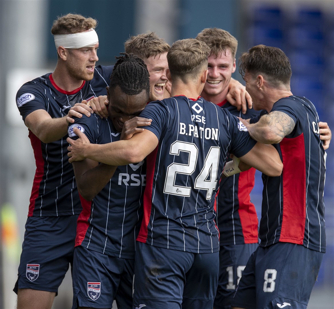 Ross County's Blair Spittal celebrates his second goal against Hearts. Picture: Ken Macpherson