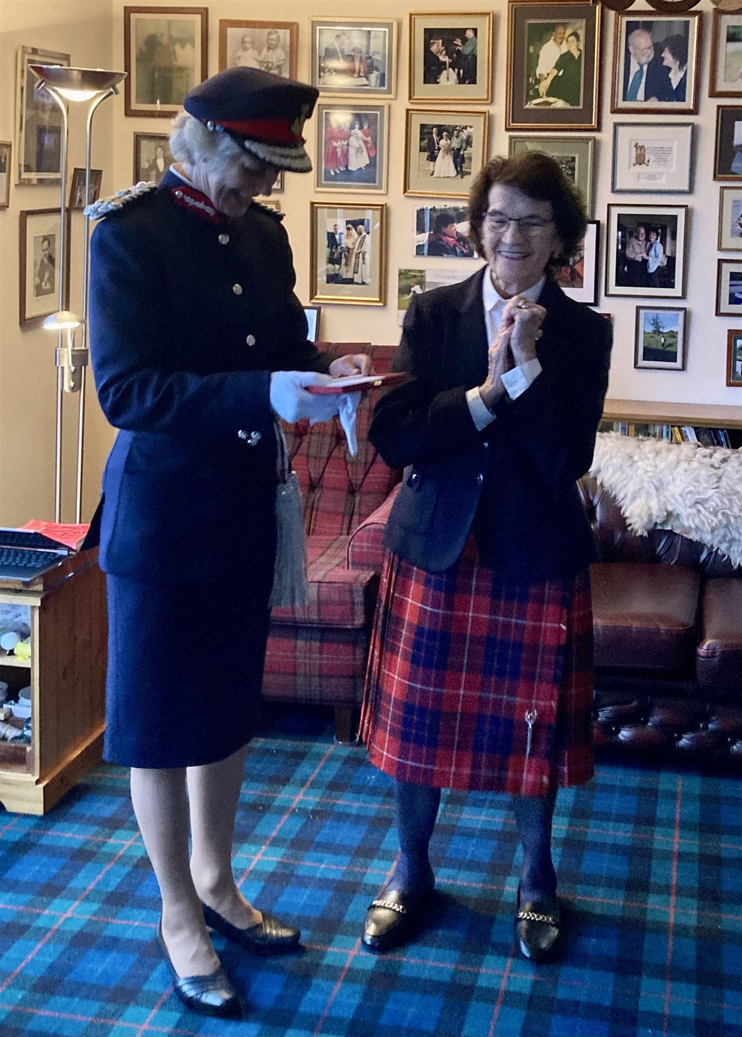 Agnes Cleghorn Redhead - better known as Nan – receives her BEM from Lord Lieutenant, Joanie Whiteford.