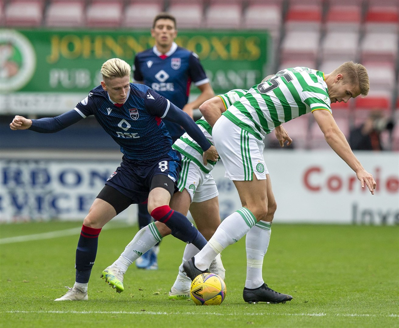 Oli Shaw vies against Celtic defender Kristoffer Ajer for the ball earlier this season. Picture: Ken Macpherson