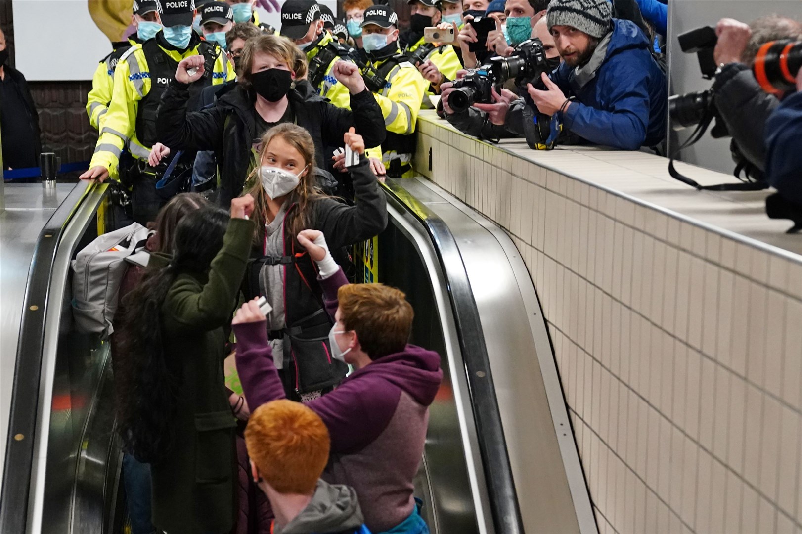 Greta Thunberg was mobbed by supporters when she arrived in Glasgow for Cop26 in 2021 (Jane Barlow/PA)
