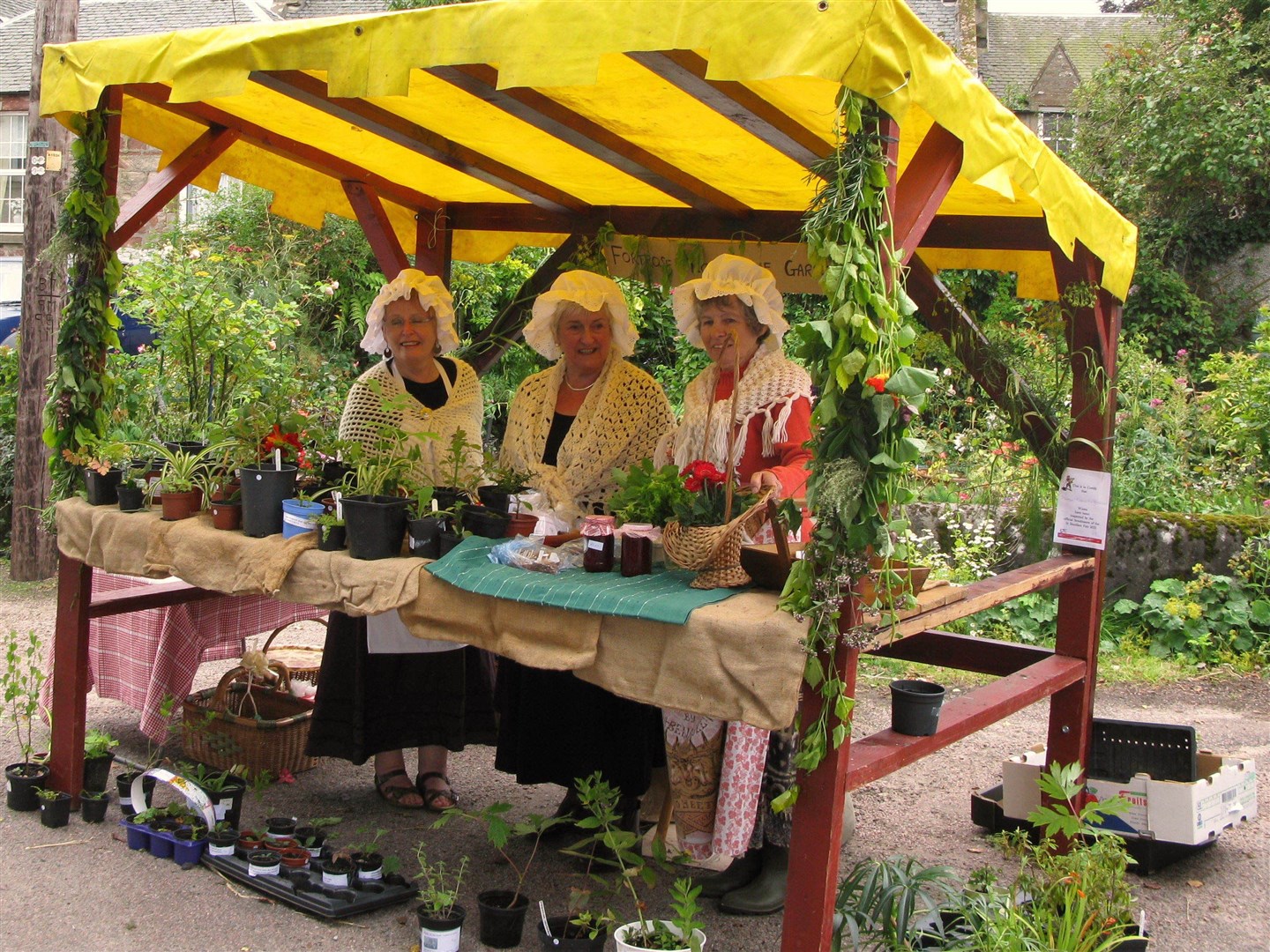 Stallholders in period costume bring colour to the event and mark its historical significance.