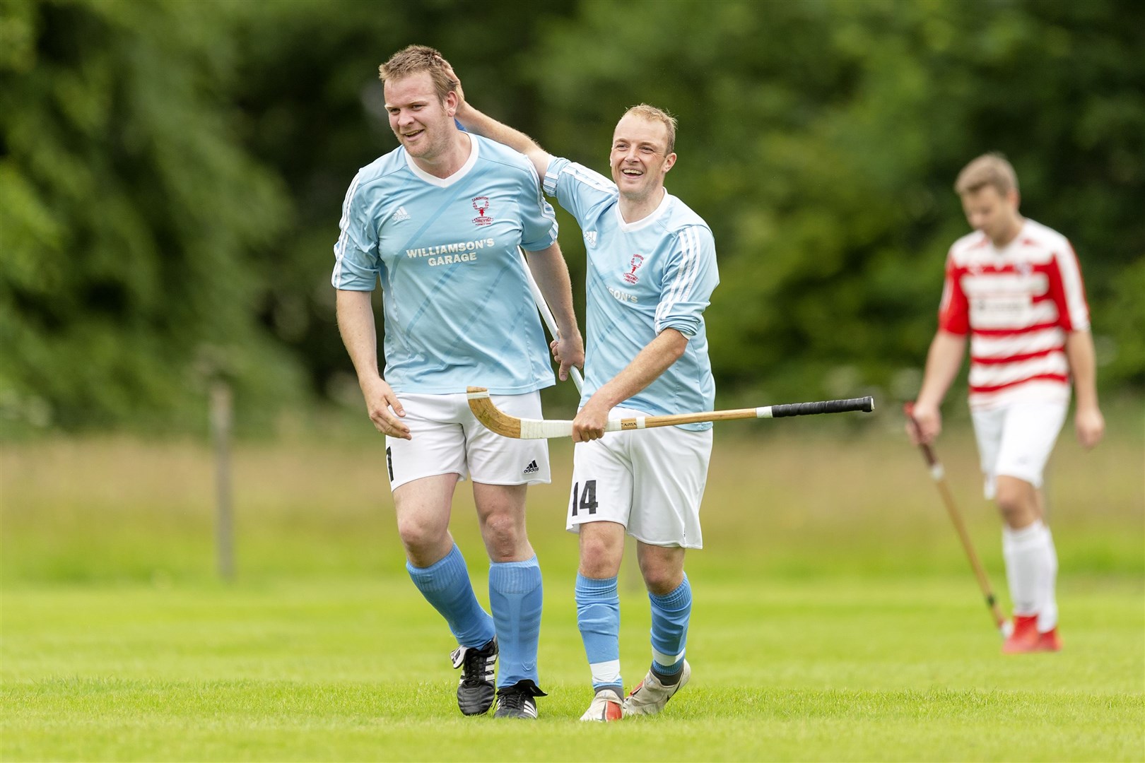 Ali MacLennan and Kevin Bartlett played in the 7-5 Camanachd Cup final defeat to Newtonmore. Pictures: Neil Paterson.