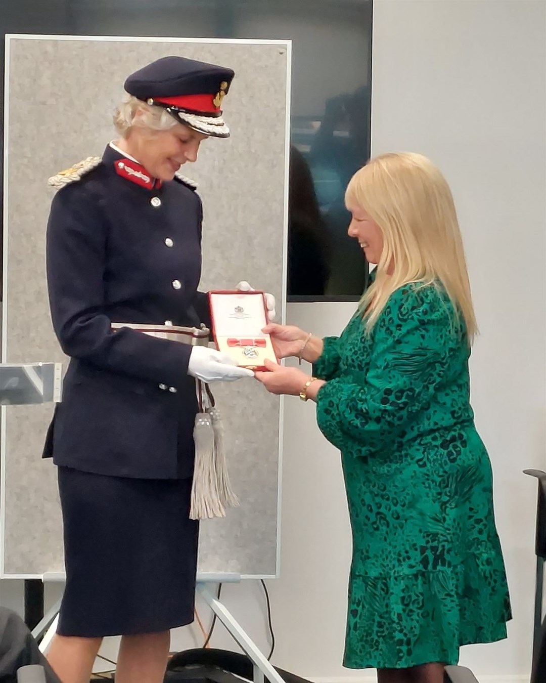 Pat Ross receives her British Empire Medal from Lord Lieutenant Joanie Whiteford.