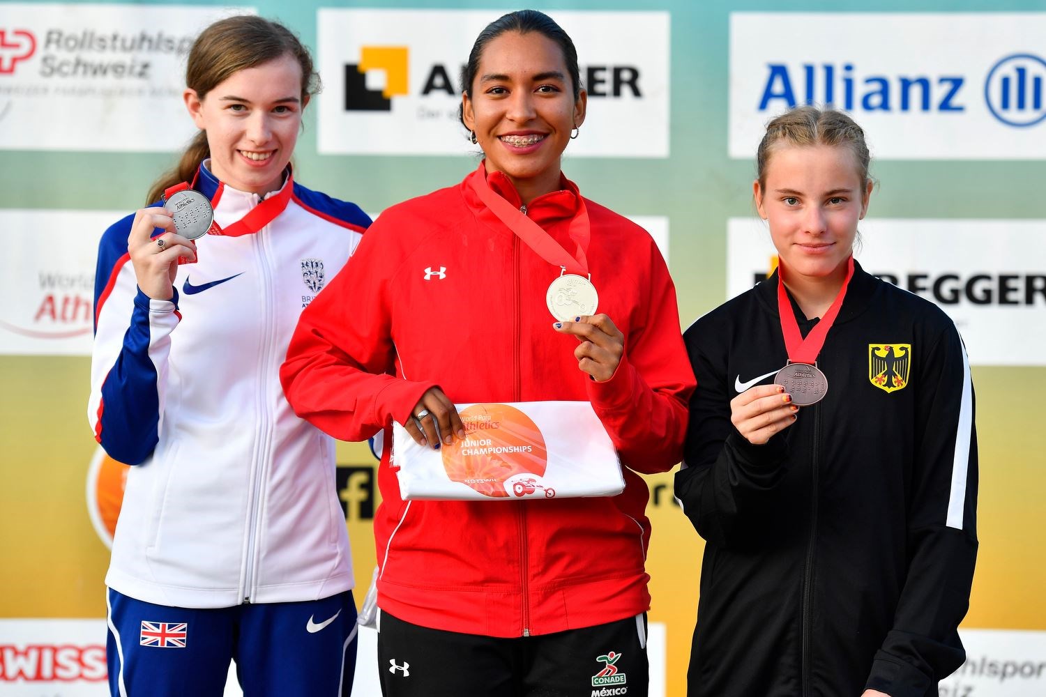 Abbie McNally with 100 metre gold medallist Sofia Karla Herrera Cardenas of Mexico and Germany's Sophie Anika Memmer. Picture: LucPercival