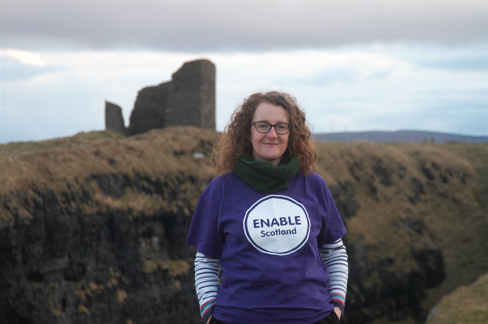 Karen Haden-Homer with the Castle of Old Wick in the background. She was taking part in a Virtual Kiltwalk to raise funds for Enable Scotland.