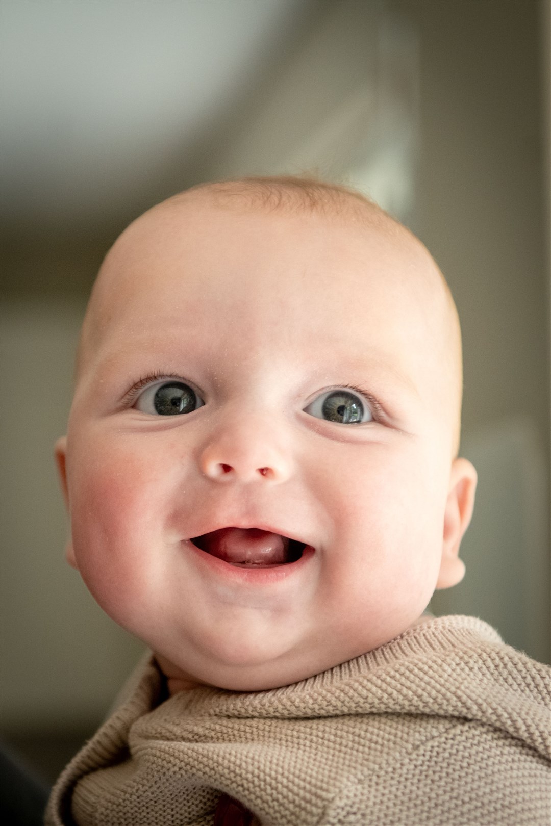 Baby Roman smiling for the camera. Picture: Callum Mackay.