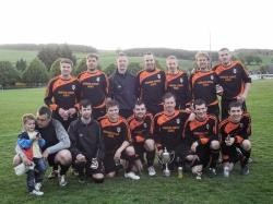 The Avoch team with the MacLean Cup which they won after a 6-2 victory over Maryburgh.