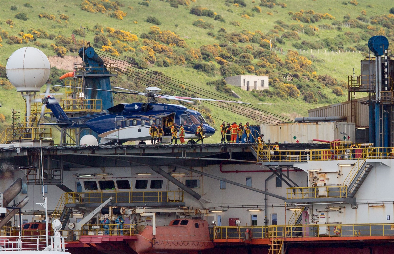 Helicopters have been deployed to remove activists from the rig in the Cromarty Firth but Greenpeace has said it won't give up. Picture: Greenpeace