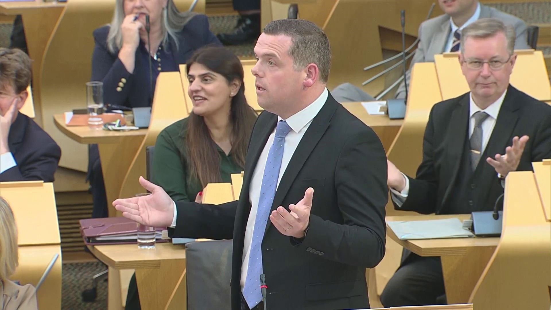 Conservative leader and Highland MSP Douglas Ross offering Humza Yousaf an intervention.